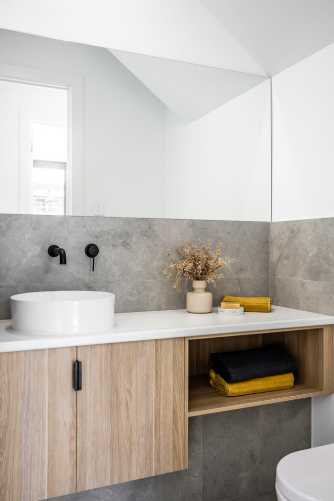 Design ideas for a small contemporary 3/4 bathroom in Adelaide with beige cabinets, gray tile, porcelain tile, white walls, grey floor, white benchtops, a single vanity and a floating vanity.