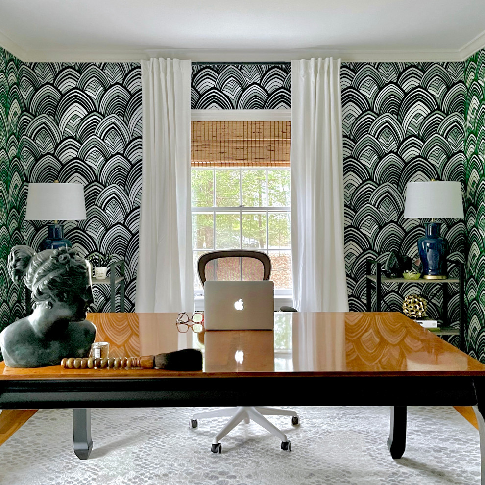 Photo of a mid-sized eclectic home office in Boston with green walls, a freestanding desk and wallpaper.