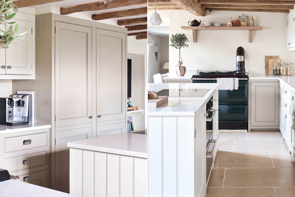 Large cottage u-shaped limestone floor open concept kitchen photo in Oxfordshire with an undermount sink, shaker cabinets, marble countertops and an island