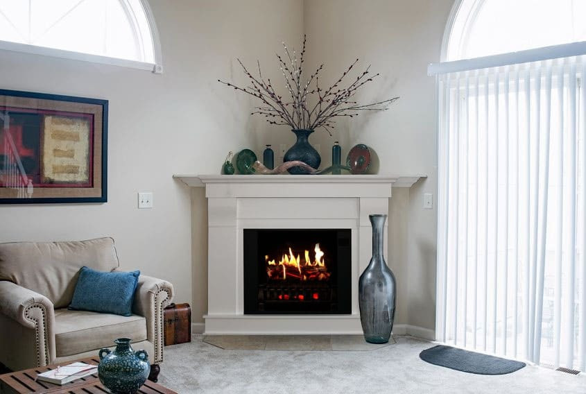Living room - mid-sized contemporary formal living room idea in Nashville with a standard fireplace, a wood fireplace surround and no tv