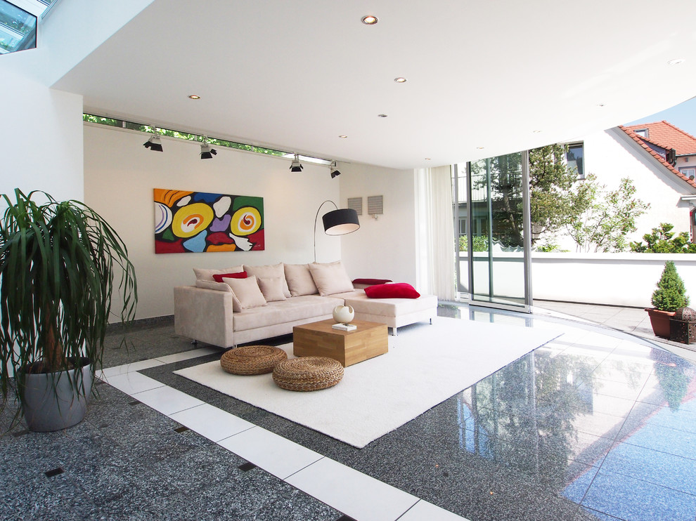 Photo of a large contemporary sunroom in Dortmund with a standard ceiling and no fireplace.