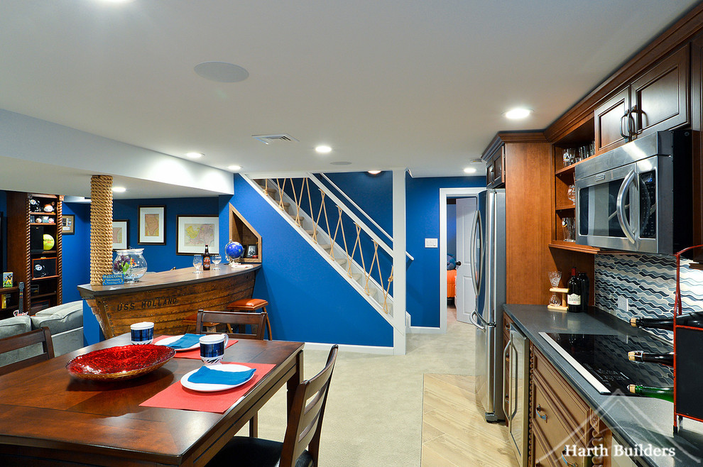 Design ideas for a large beach style basement in Philadelphia with blue walls and carpet.