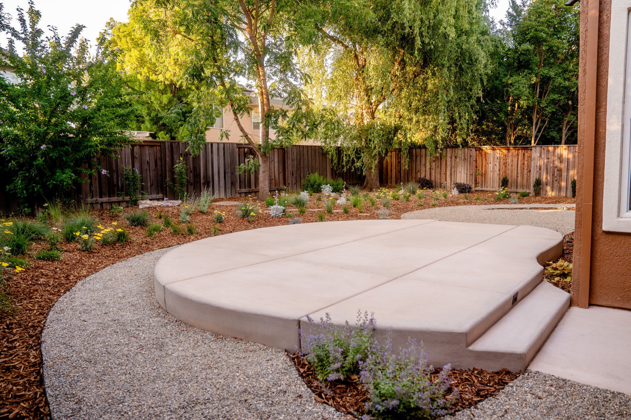 Soft Meadow Planting Meets Sculptural Hardscape