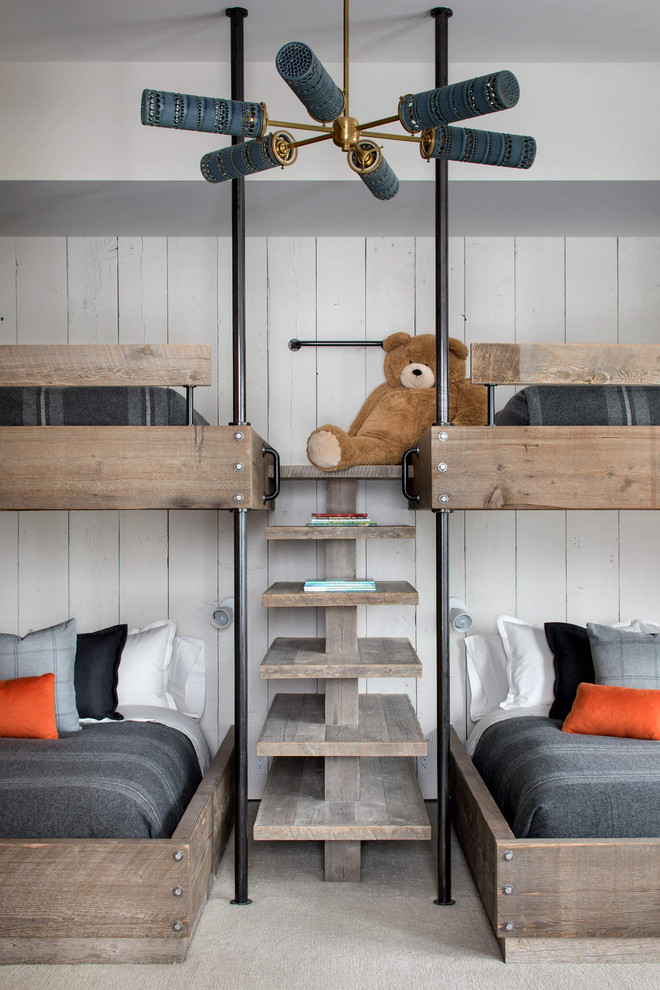 Modern Ski Home - Example of a mountain style boy carpeted and beige floor kids' room design with white walls