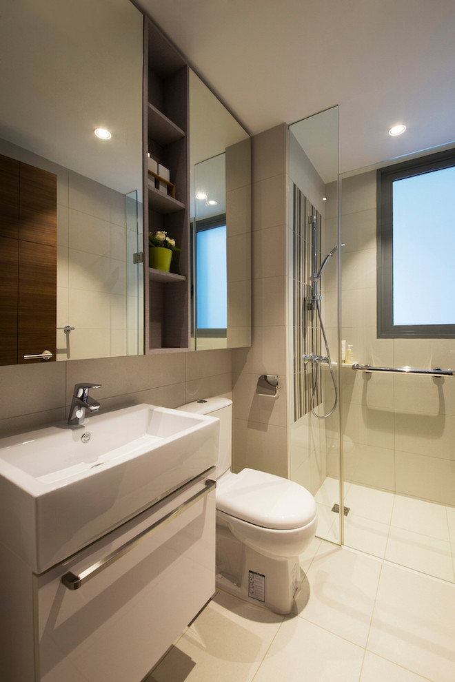 Photo of a small contemporary bathroom in Singapore with beaded inset cabinets.