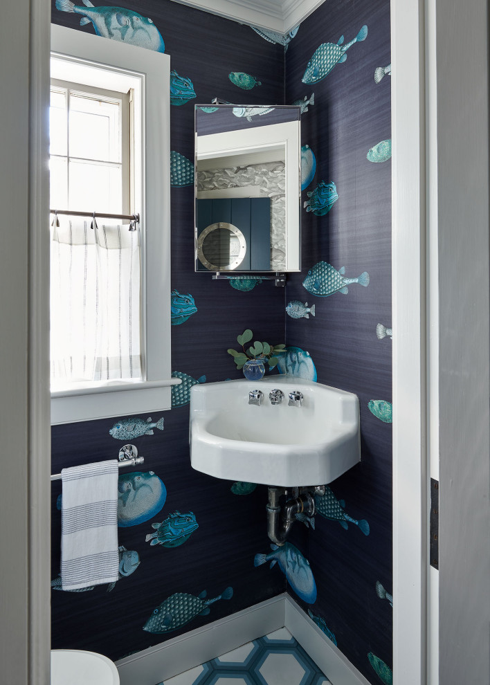 Example of a beach style powder room design in New York