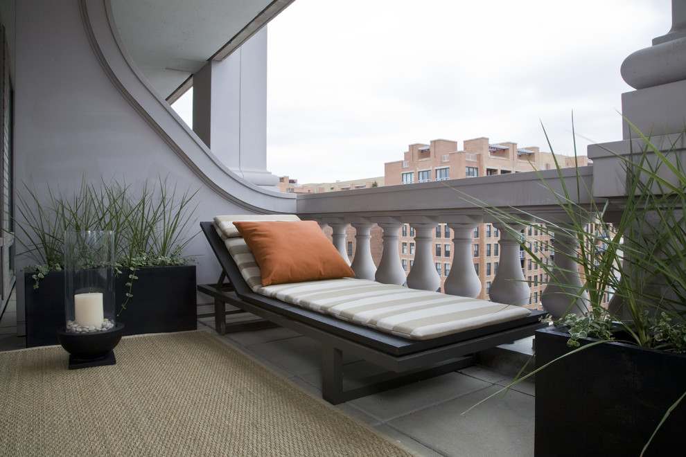 This is an example of a traditional balcony in DC Metro with a roof extension.