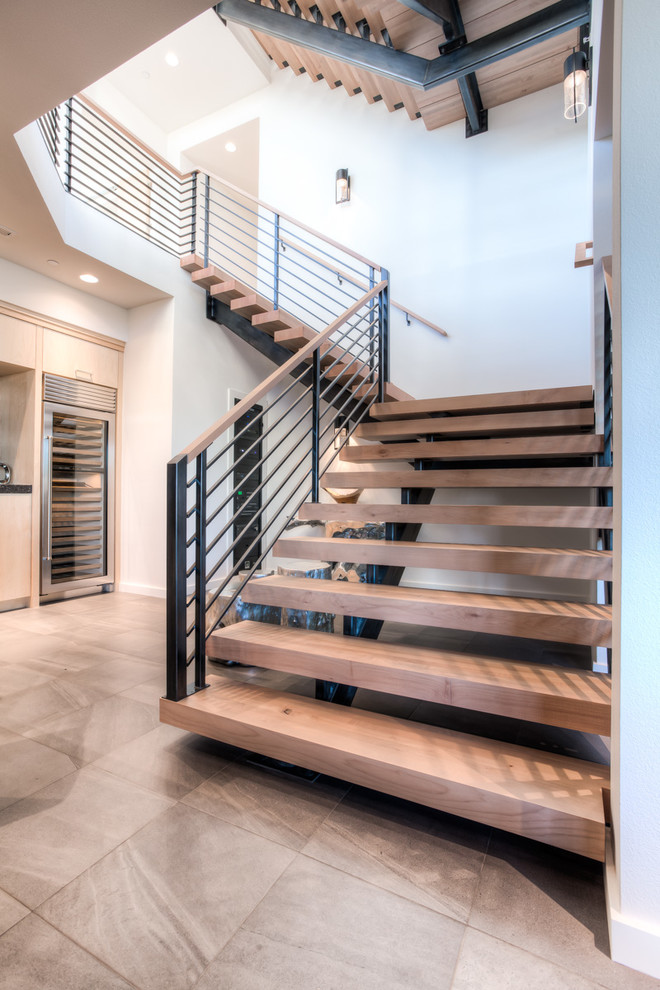 Photo of an expansive contemporary floating staircase in Portland.