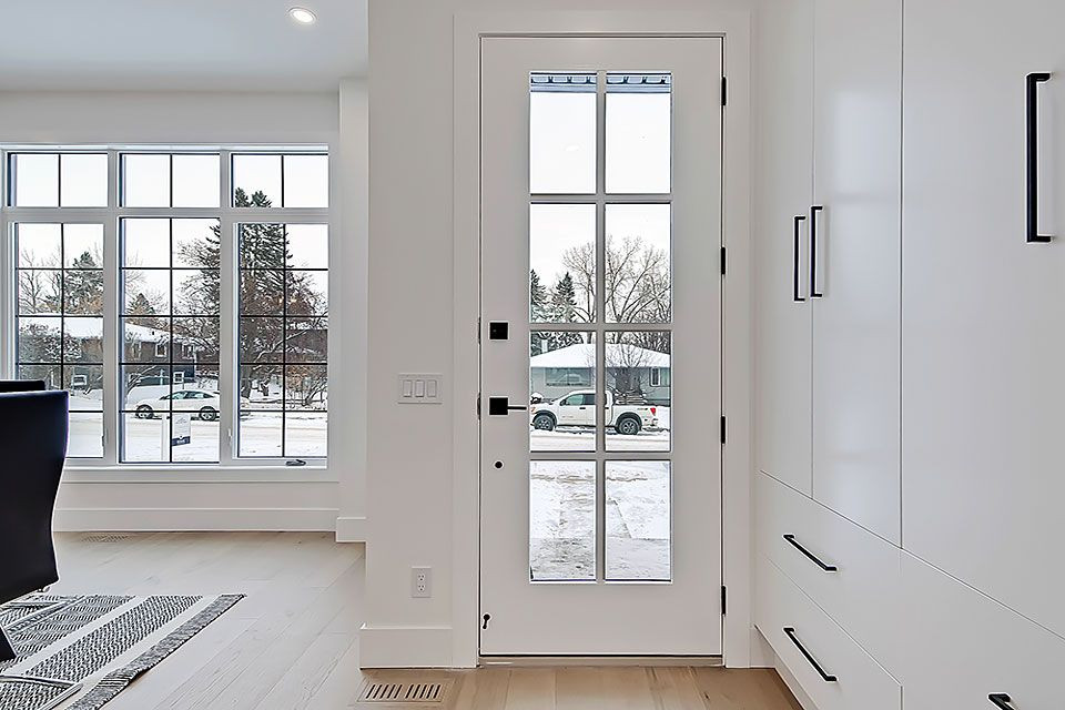 Transitional home design photo in Calgary