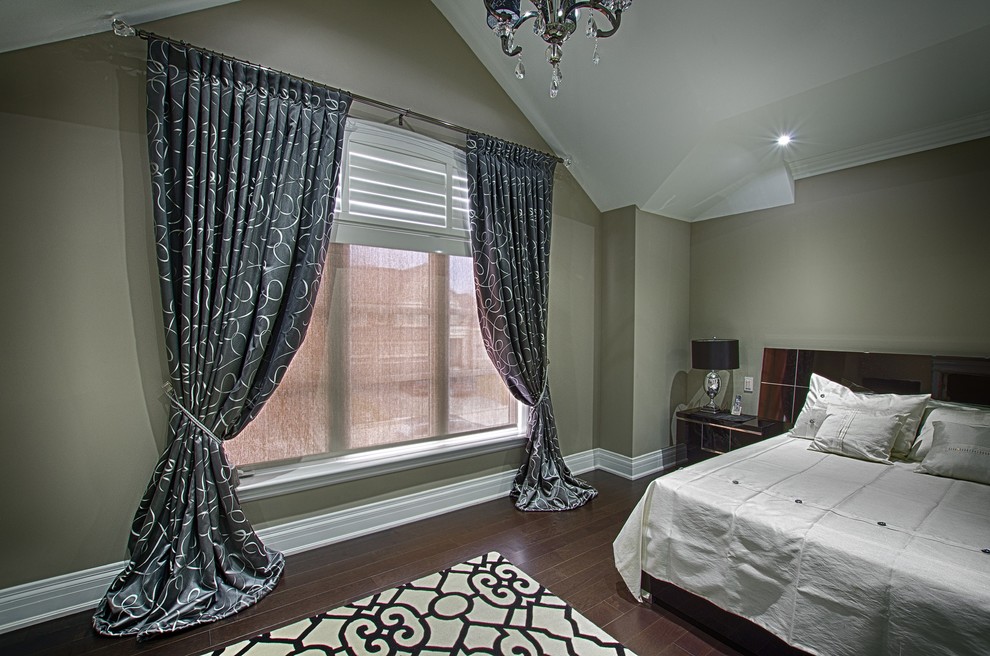 Inspiration for a mid-sized transitional master dark wood floor bedroom remodel in Toronto with beige walls and no fireplace