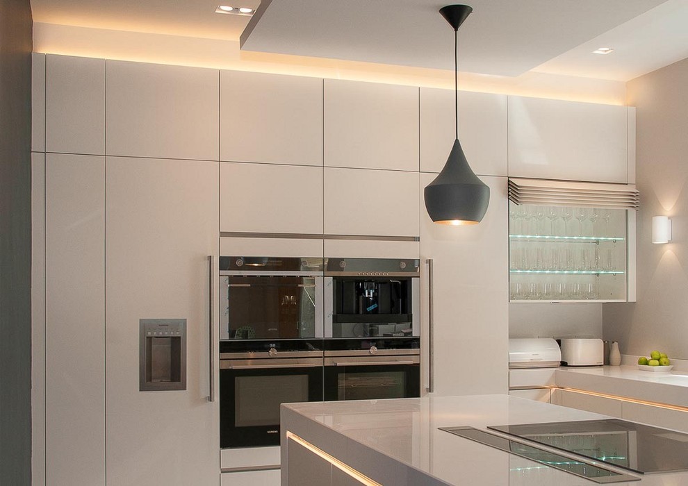 Photo of a large contemporary kitchen in Sussex.