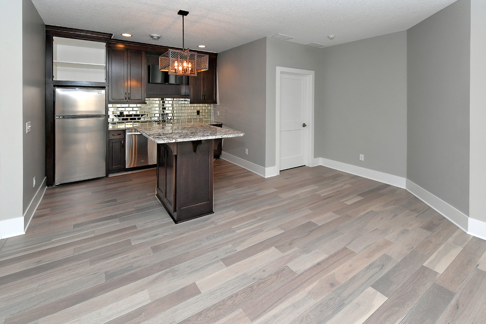 Example of a transitional home design design in Minneapolis