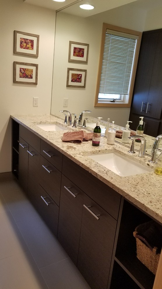 Photo of a mid-sized contemporary master bathroom in Minneapolis with flat-panel cabinets, dark wood cabinets, white walls, porcelain floors, an undermount sink, quartzite benchtops, grey floor and multi-coloured benchtops.