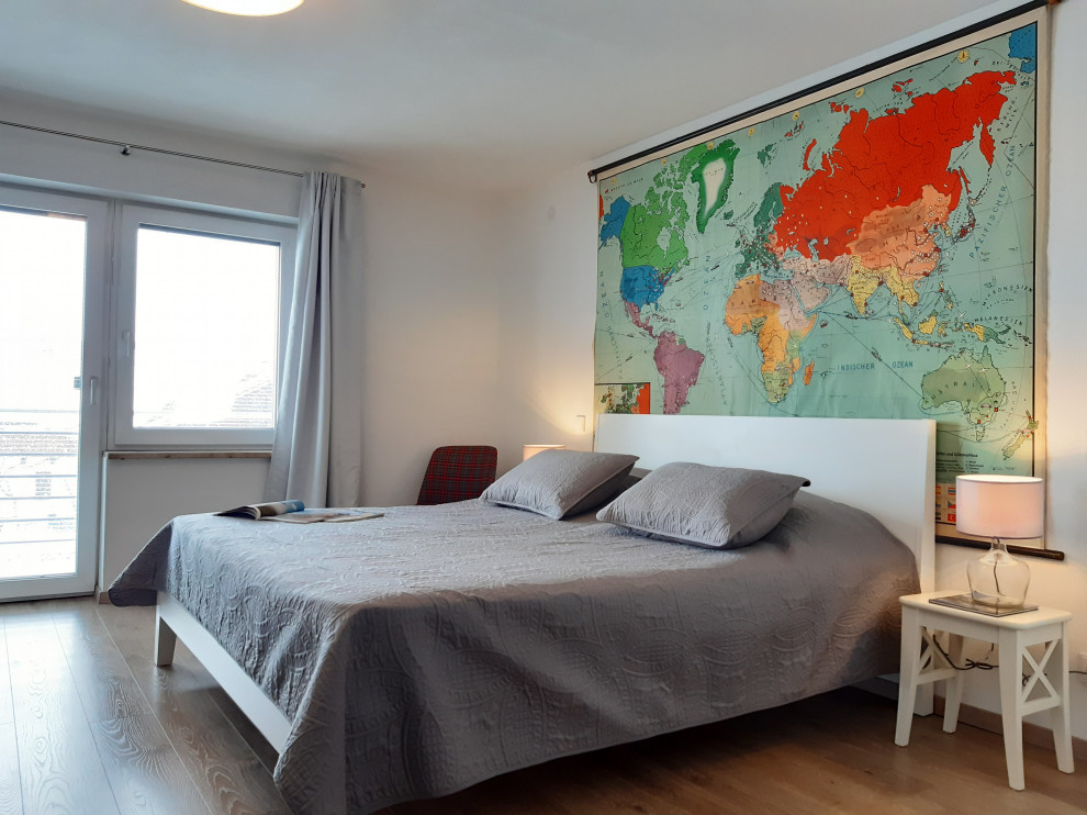This is an example of a medium sized contemporary master bedroom in Munich.