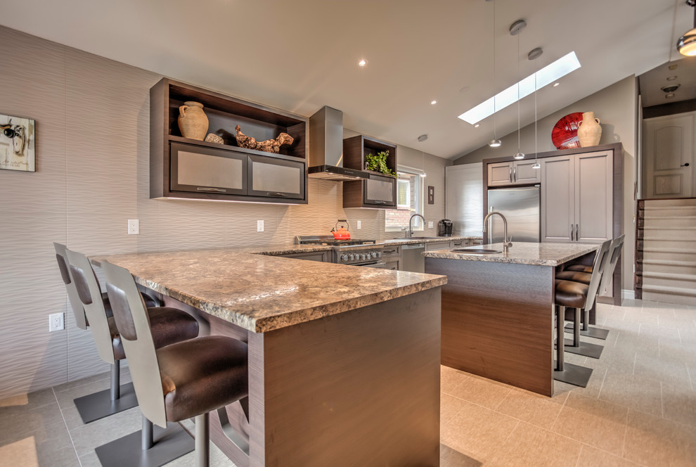 Transitional ceramic tile open concept kitchen photo in Toronto with a single-bowl sink, flat-panel cabinets, brown cabinets, laminate countertops, beige backsplash, ceramic backsplash, stainless steel appliances and an island