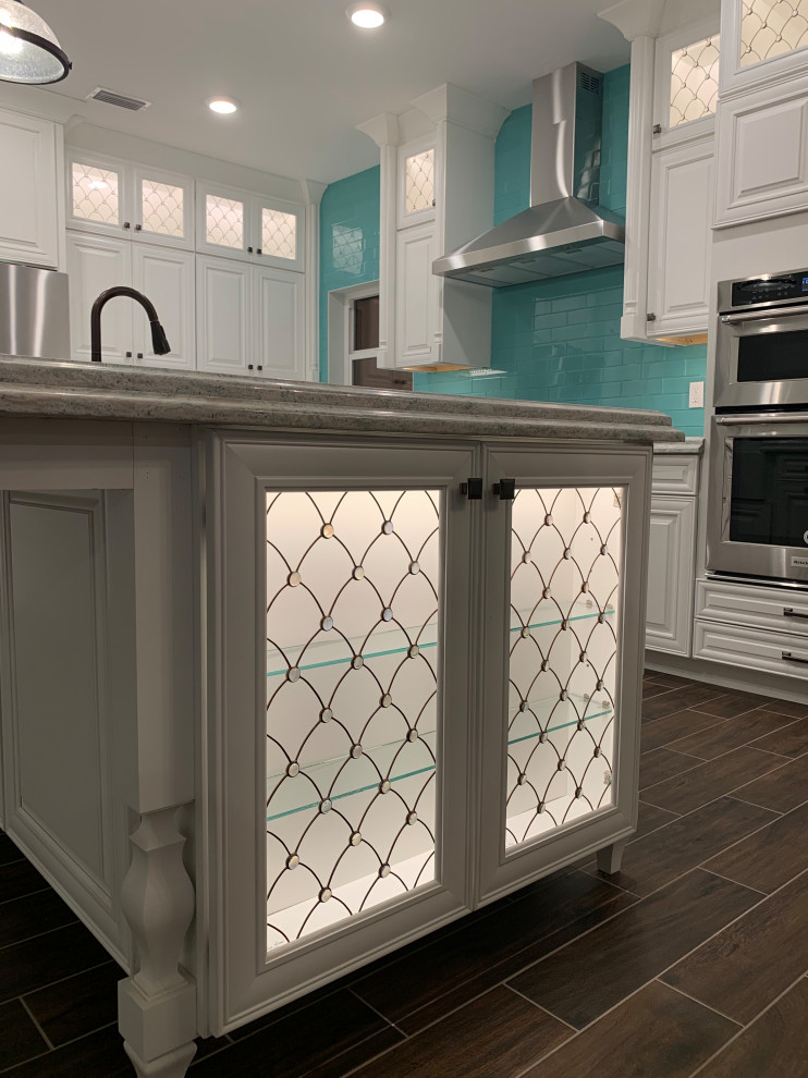 Example of a transitional kitchen design in Miami
