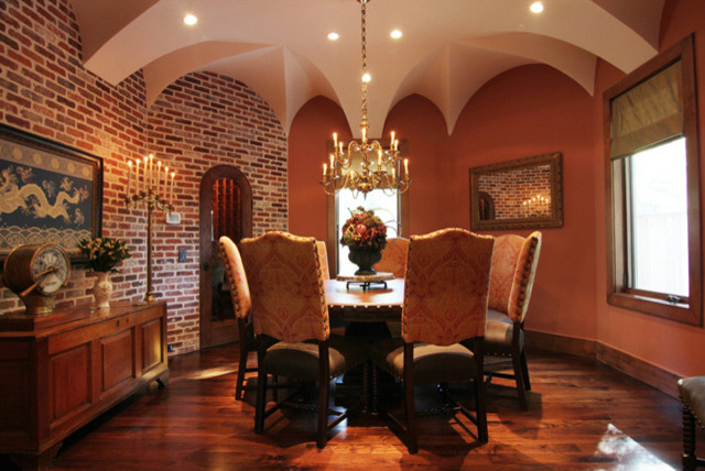 Tuscan dining room photo in Houston