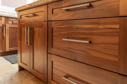 Has a stain been added to the walnut wood cabinets? if so ...