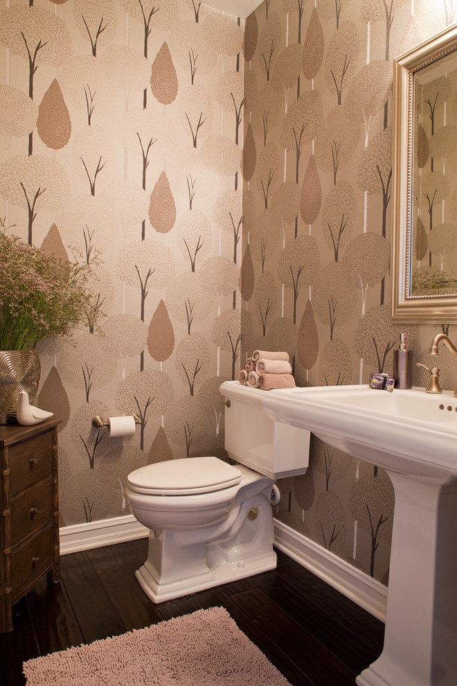 Inspiration for a traditional powder room in Orange County with a pedestal sink.