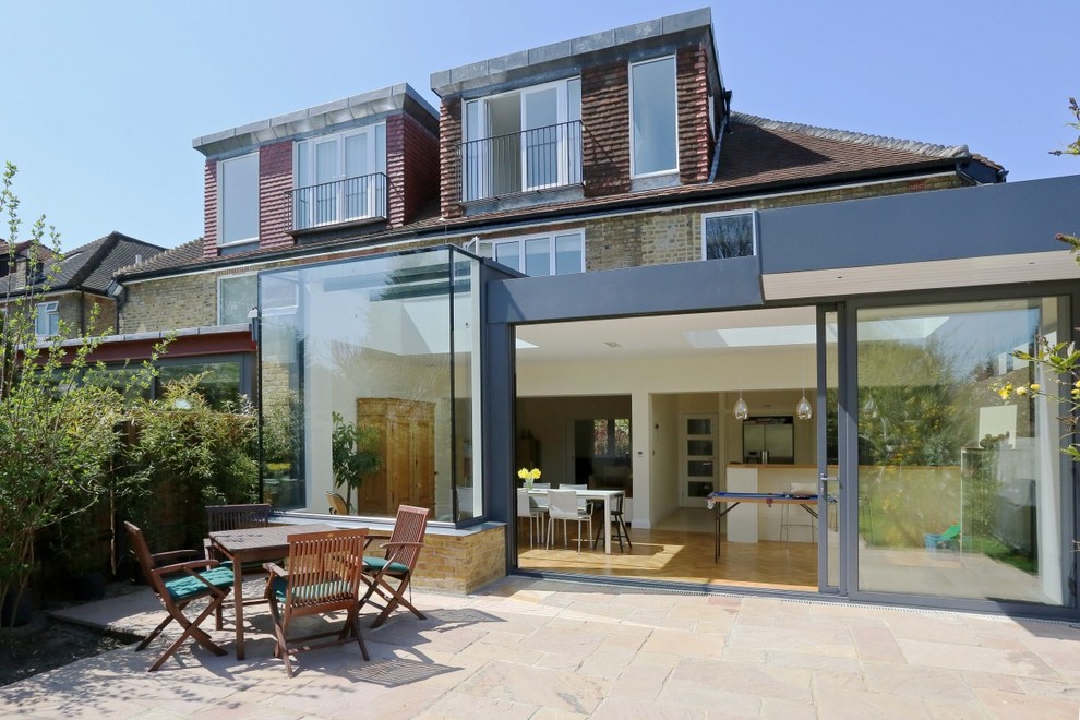 This is an example of a large contemporary two-storey exterior in London.