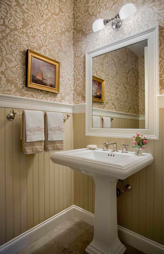 Design ideas for a small beach style powder room in Boston with brown walls, ceramic floors, a pedestal sink and brown floor.
