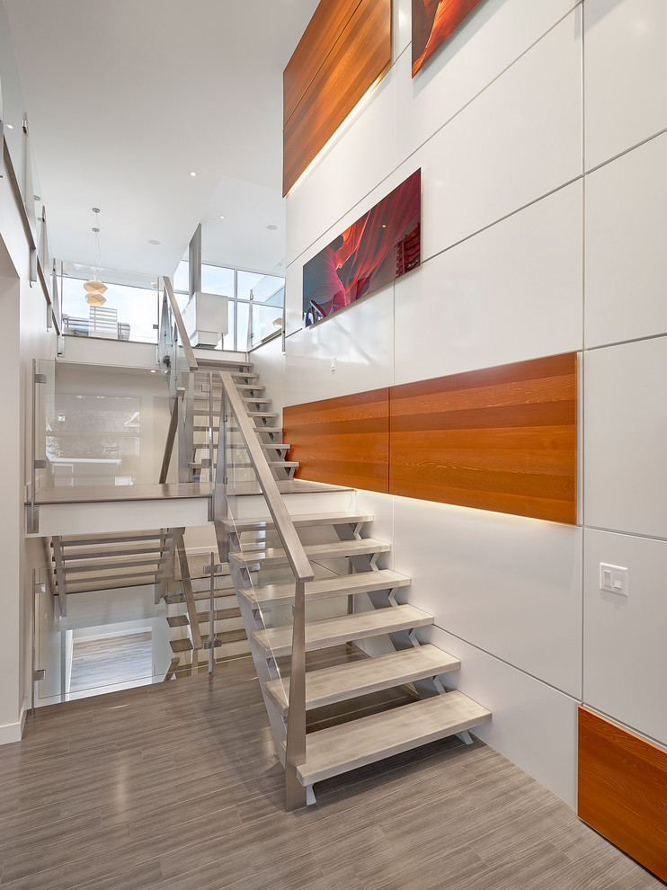 Photo of a modern staircase in Edmonton with open risers.