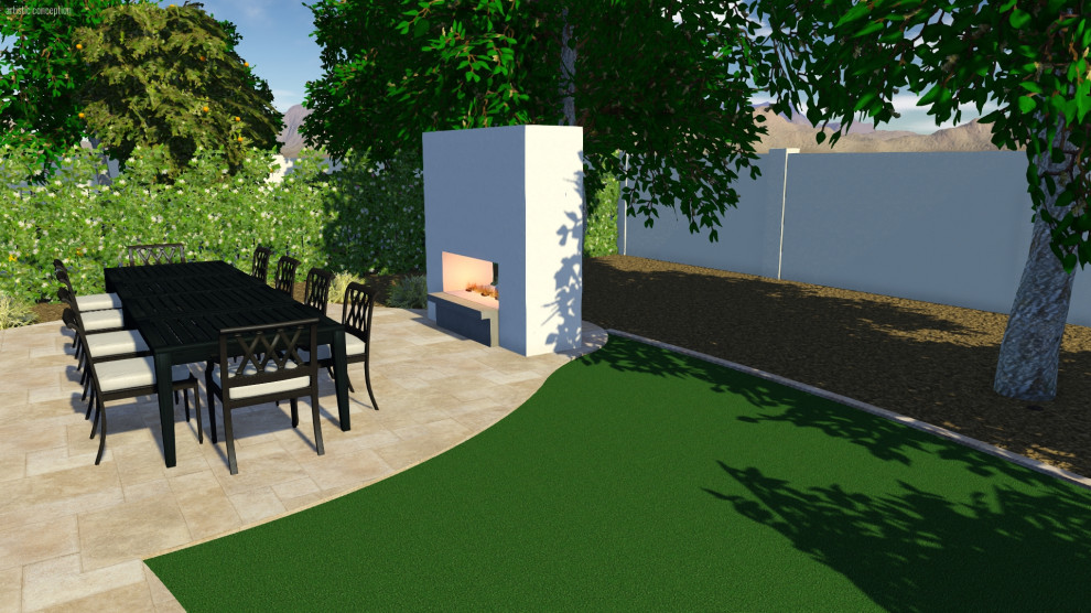 Foto di un ampio giardino chic esposto in pieno sole dietro casa in primavera con un caminetto e pavimentazioni in cemento