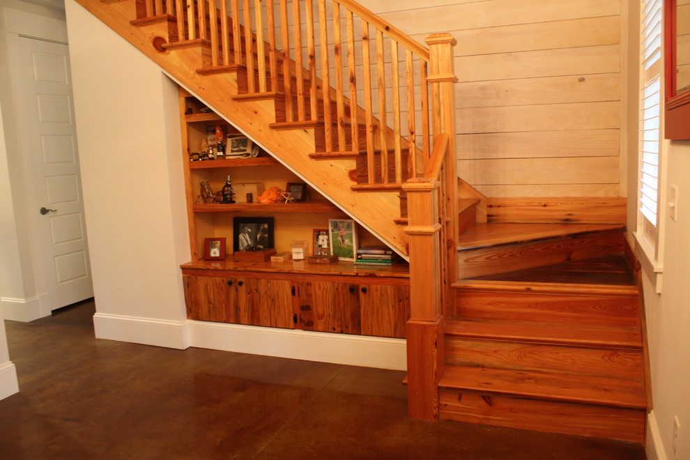 Design ideas for a mid-sized traditional wood l-shaped staircase in Atlanta with wood risers and wood railing.