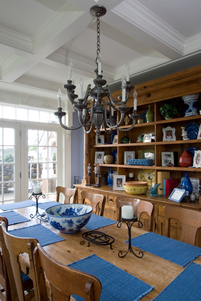 Inspiration for a large beach style separate dining room in Providence with blue walls and no fireplace.