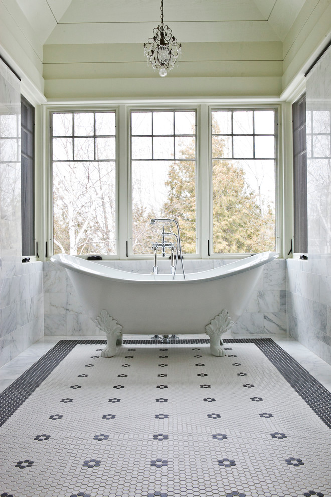 This is an example of a mid-sized traditional master bathroom in Other with a claw-foot tub, white walls, mosaic tile floors and white floor.