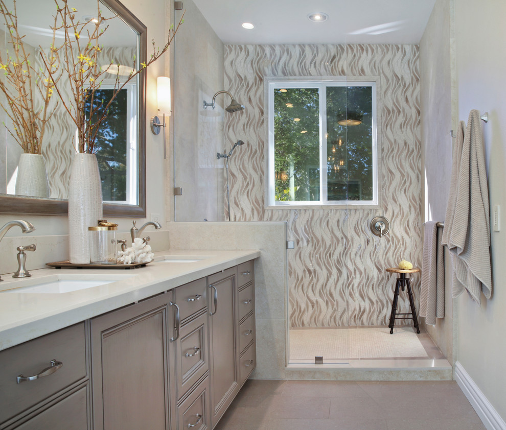 Design ideas for a mid-sized transitional master bathroom in Orange County with recessed-panel cabinets, distressed cabinets, a freestanding tub, an open shower, a two-piece toilet, beige tile, porcelain tile, beige walls, porcelain floors, an undermount sink, quartzite benchtops, beige floor and an open shower.