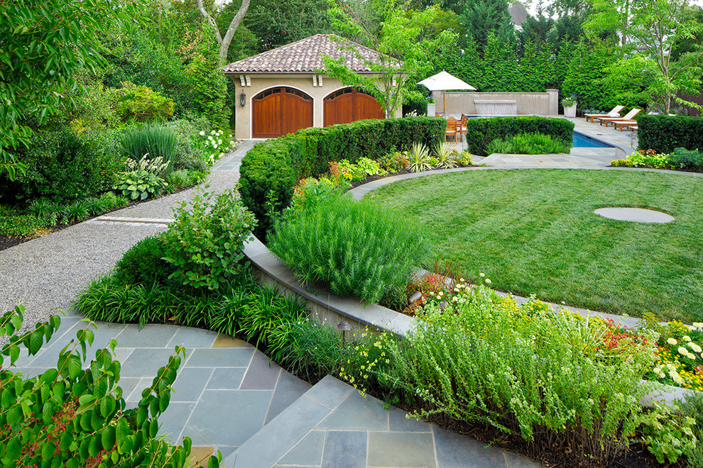 This is an example of a traditional garden in DC Metro with a water feature.