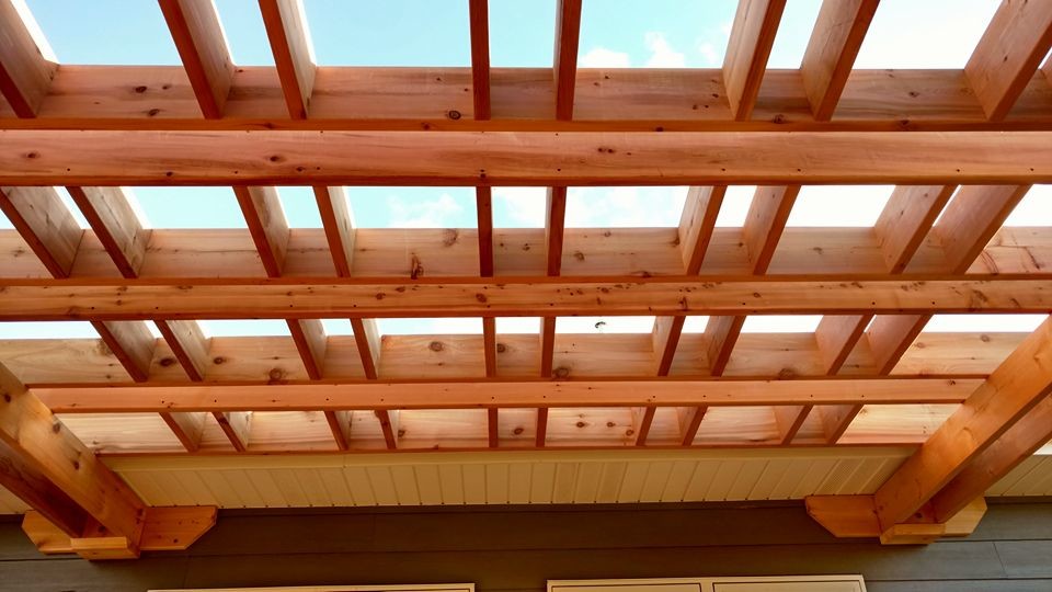 Deck - large rustic deck idea with a pergola