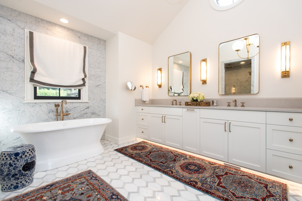 Inspiration for a large traditional master bathroom in Portland with shaker cabinets, white cabinets, a double vanity, a floating vanity, a japanese tub, white tile, white walls, a drop-in sink, white floor and grey benchtops.