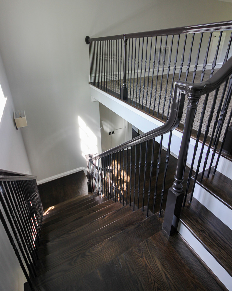 Large transitional wooden l-shaped mixed material railing staircase photo in DC Metro with painted risers