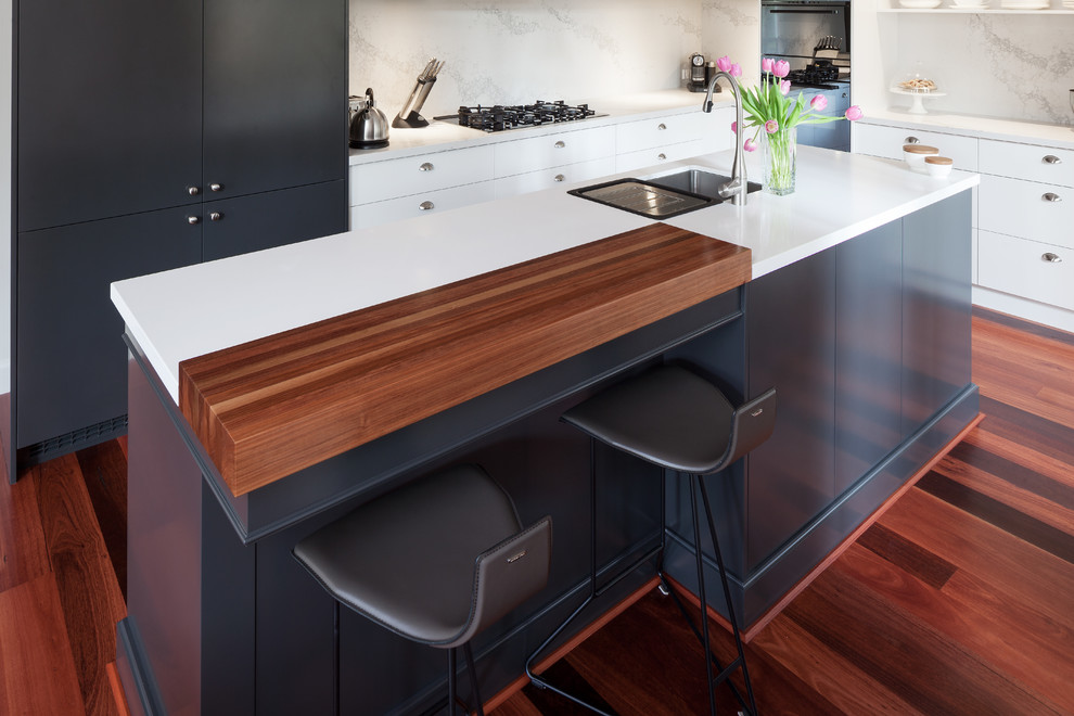 Inspiration for a contemporary kitchen in Perth with an undermount sink, flat-panel cabinets, quartz benchtops, white splashback, stone slab splashback, with island, white cabinets and white benchtop.