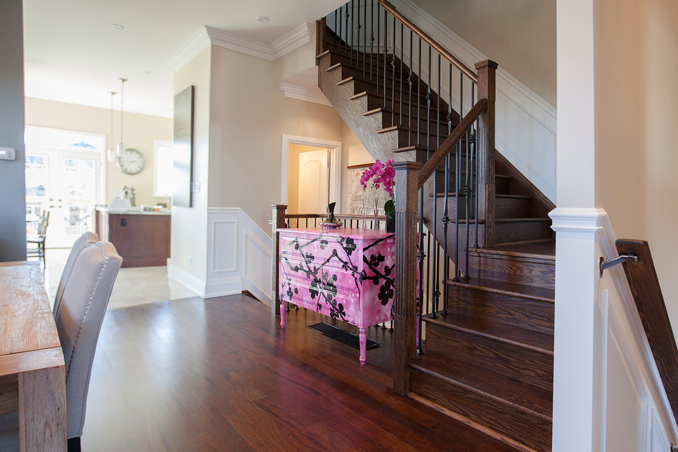 Inspiration for a mid-sized transitional hallway in Toronto with beige walls, dark hardwood floors and brown floor.