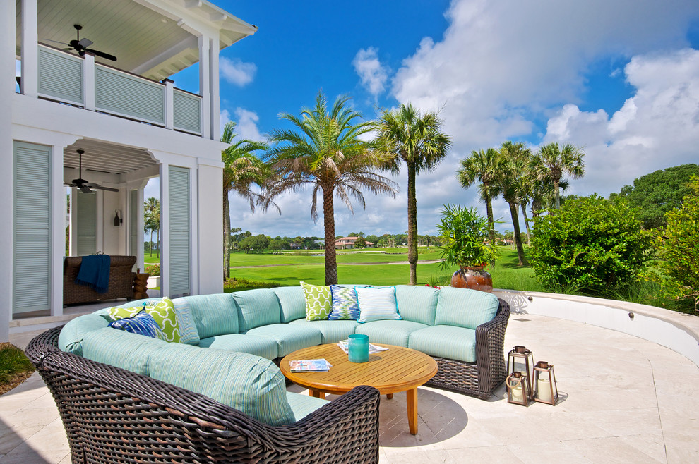 Example of an island style patio design in Jacksonville