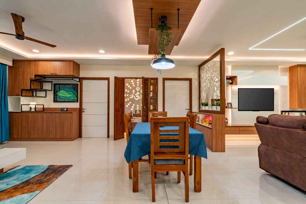 Design ideas for a contemporary dining room in Hyderabad.