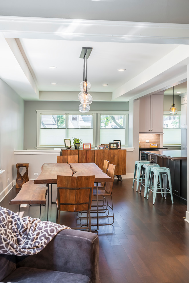 Open concept kitchen - large transitional galley dark wood floor open concept kitchen idea in Chicago with a farmhouse sink, recessed-panel cabinets, quartzite countertops, gray backsplash, ceramic backsplash, stainless steel appliances and an island
