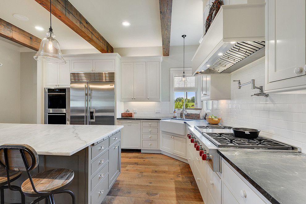 Example of a transitional kitchen design in New Orleans