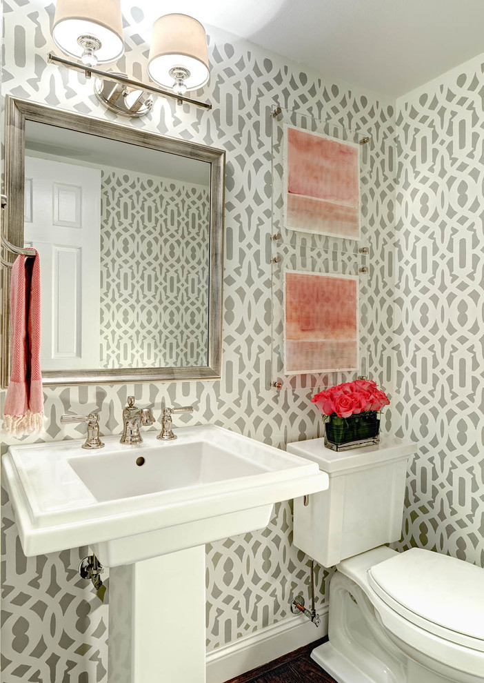 This is an example of a transitional powder room in Charlotte with a pedestal sink and a two-piece toilet.