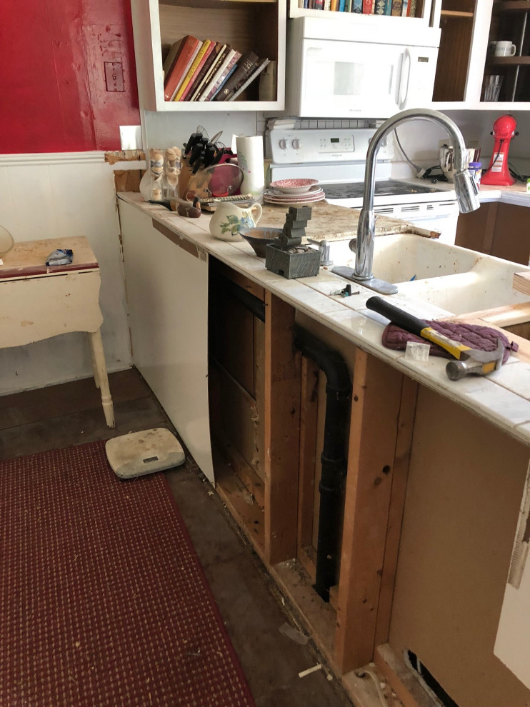 Mid-sized trendy u-shaped kitchen photo in St Louis with a drop-in sink, shaker cabinets, white cabinets, granite countertops, gray backsplash, subway tile backsplash, white appliances, a peninsula and gray countertops