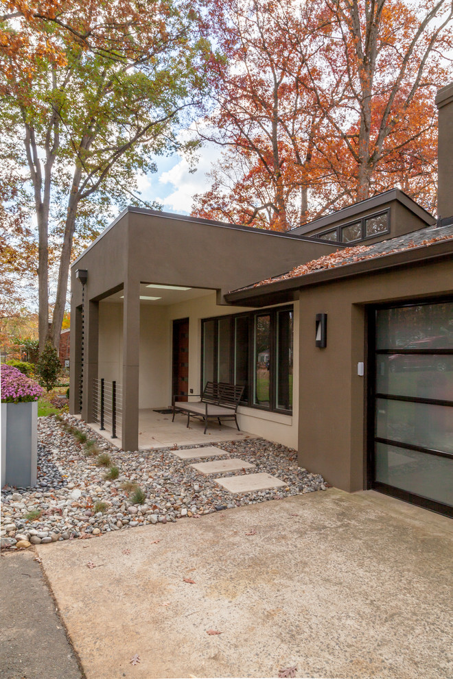 Photo of a contemporary one-storey brown exterior in DC Metro.