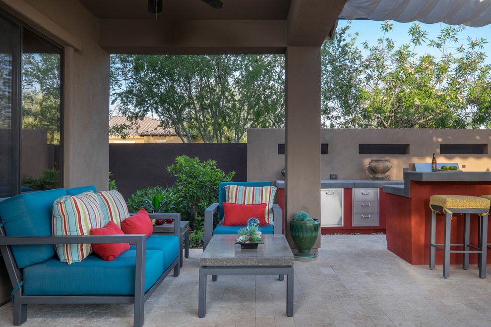 Photo of a large modern backyard patio in Phoenix with a fire feature, tile and a gazebo/cabana.