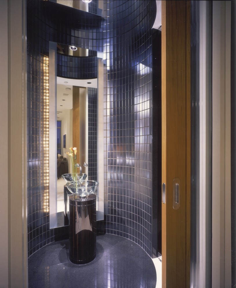 This is an example of a mid-sized contemporary bathroom in Seattle with a vessel sink.