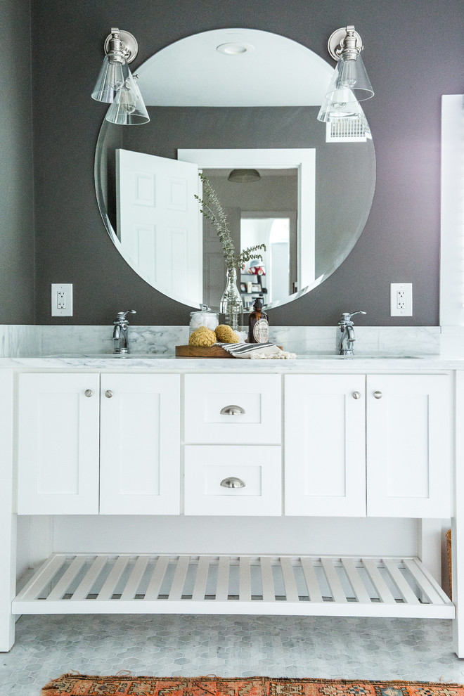 Design ideas for a mid-sized master bathroom in Boston with shaker cabinets, white cabinets, a claw-foot tub, a corner shower, a two-piece toilet, white tile, subway tile, grey walls, marble floors, an undermount sink and marble benchtops.