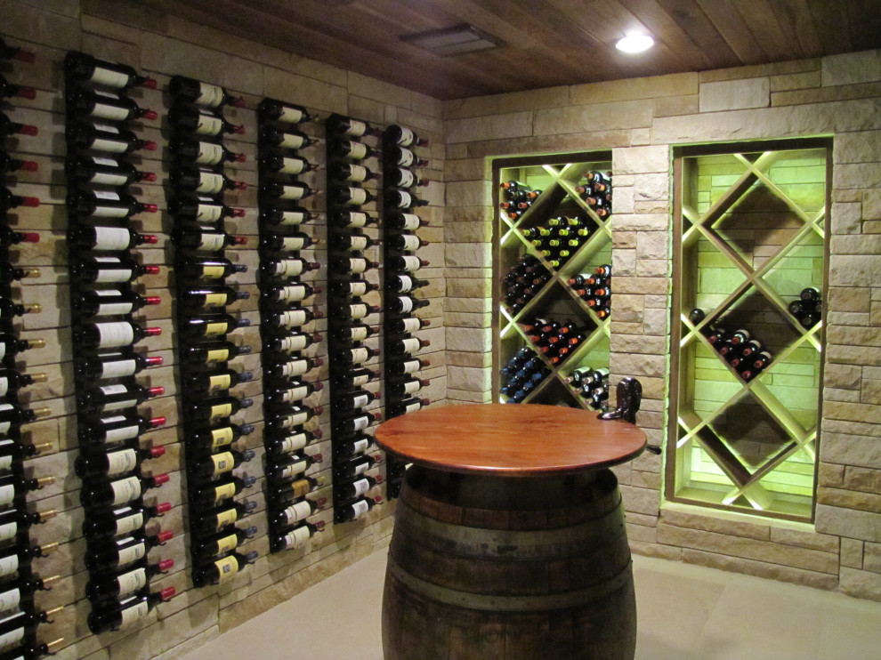 This is an example of a mid-sized industrial wine cellar in Austin.