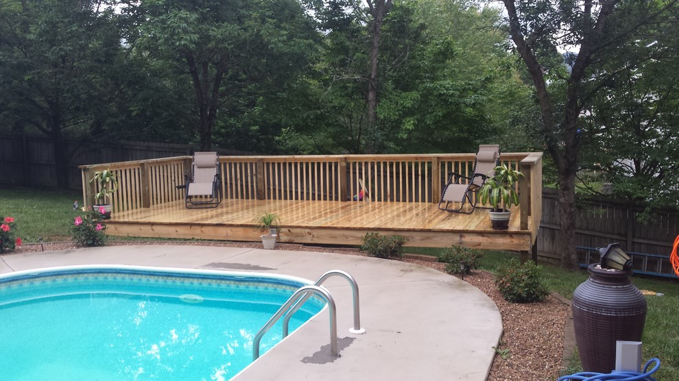 Photo of a traditional backyard deck in Other.