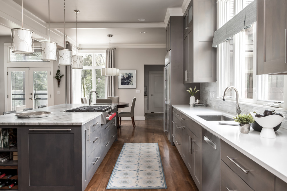 Example of a transitional kitchen design in Denver